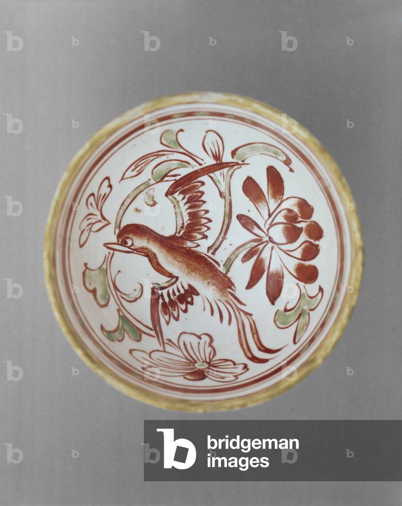 Cizhou ware-type, c.12th century (Stoneware with white slip, overglaze
decoration in red, blue-green, ochre)