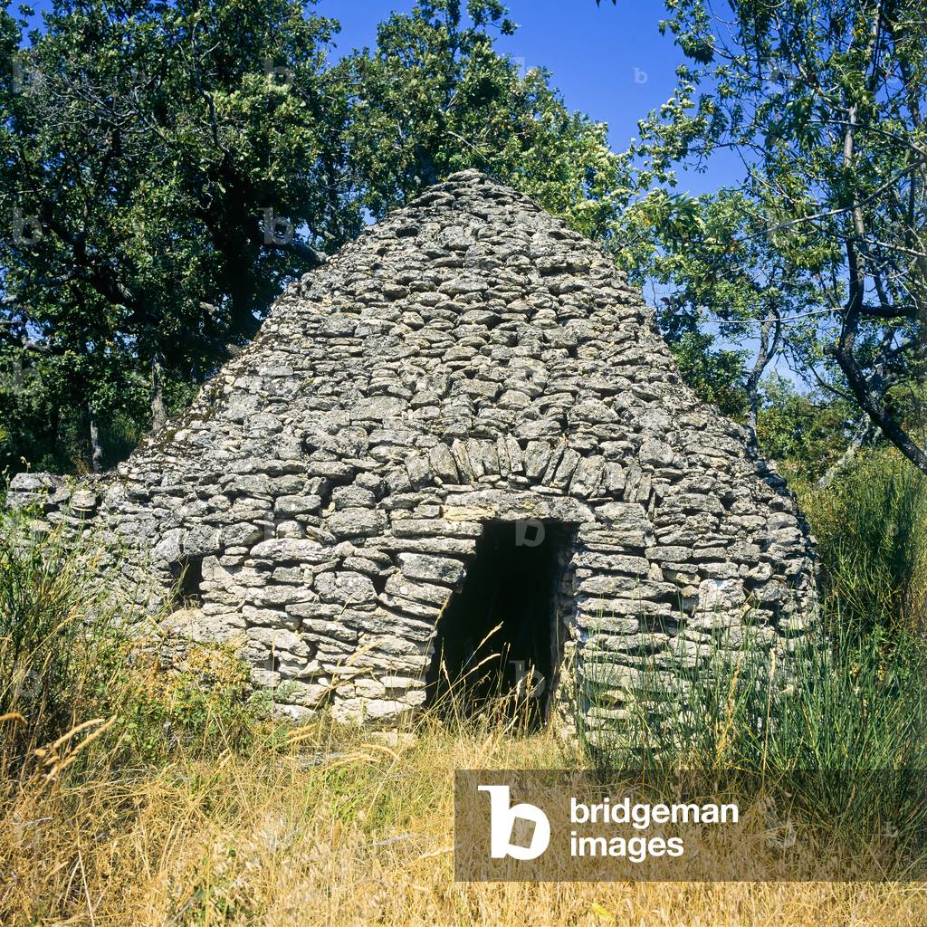View of a borie, ancient drystone sheepfold, Provence, France (photo)