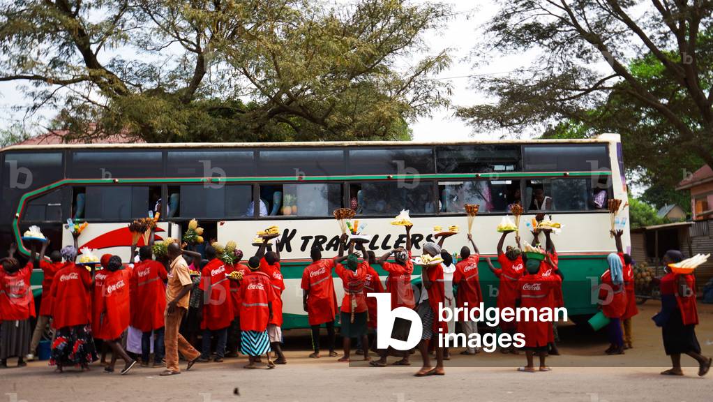 Selling at the bus stop in Uganda
