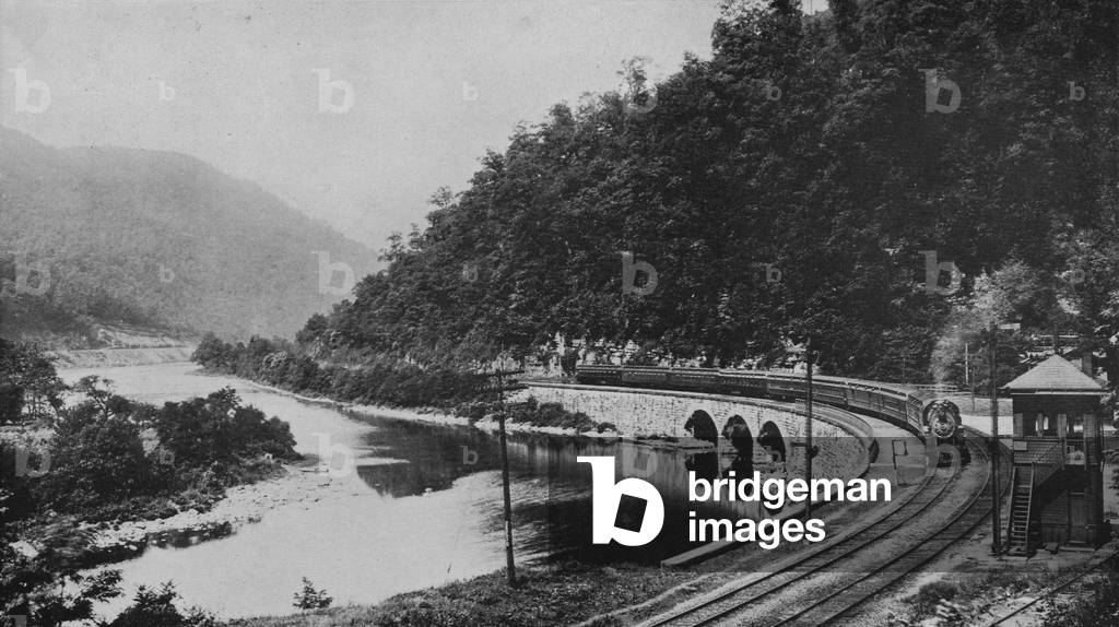 A Train On The Baltimore And Ohio Railroad Going Through Youghiogheny Valley
