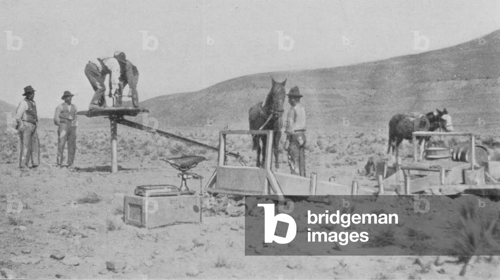 Men Using A New York Engineering Company Empire Drill In Bolivia