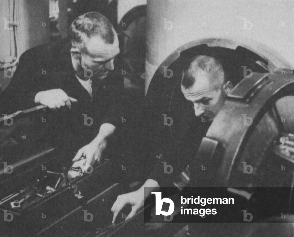 Men On Board The USS George Washington Submarine, At Work On The Tube In The Lower Missile Level