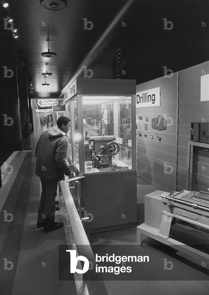A Young Boy At The Planing Display