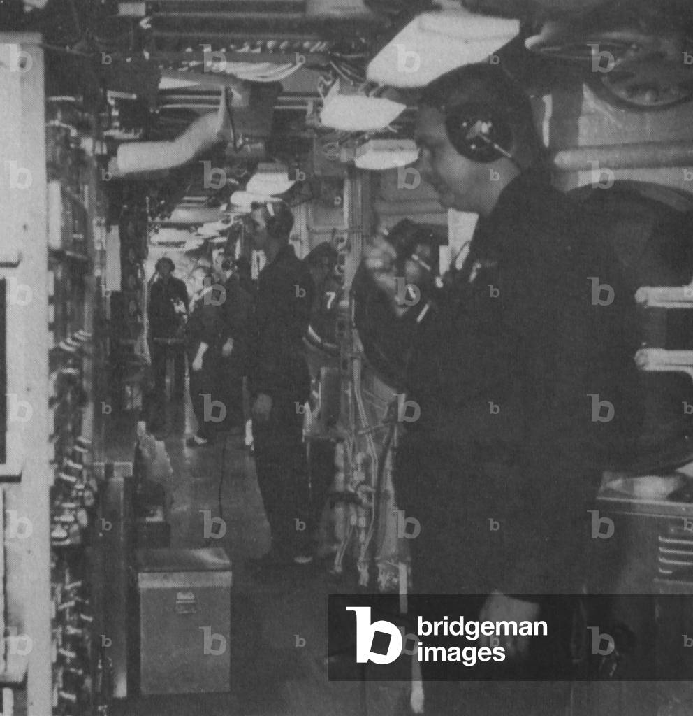 Men On Board The USS George Washington Submarine, Who Are Stationed In The Center Missile Level
