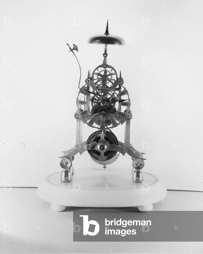 A Brass Frame Clock Designed By John Hall Of Manchester, England