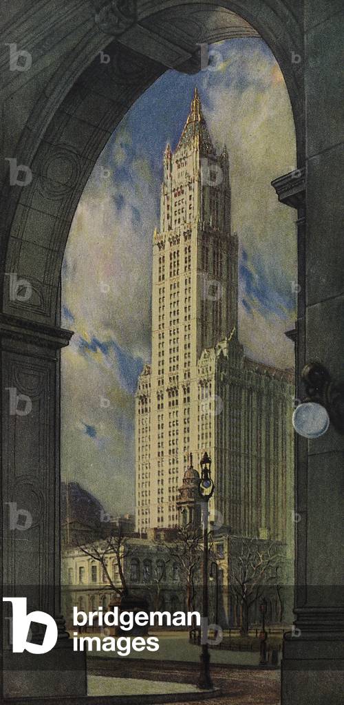View Of The Woolworth Building, Also Known As The Cathedral Of Commerce, Through The Arch Of The Municipal Building, In The Early Morning