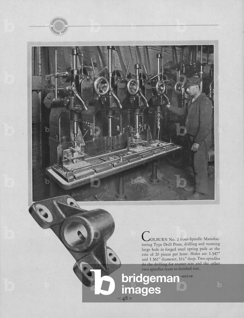A Man Using A Colburn Number 2, Four Spindle Manufacturing Drill Press
