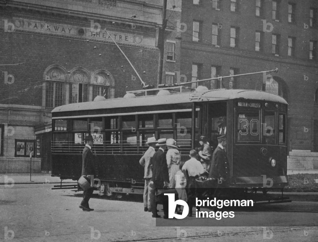 Image Of Passengers Disembarking A Westinghouse Electric & Manufacturing Company's Safety Car In Baltimore, Maryland, 1920 (photo)