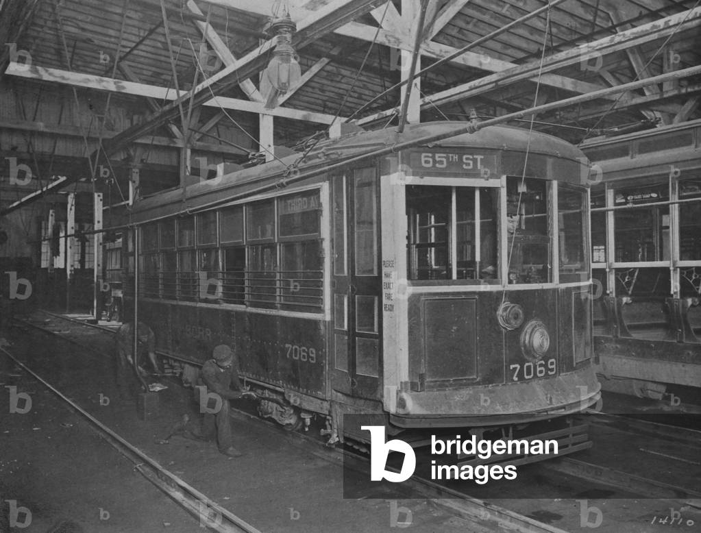 Man Performing Inspection Of A Westinghouse Electric And Manufacturing Company's Safety Car