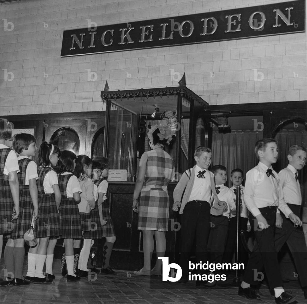 A Group Of School Children At The Nickelodeon Theater Box Office