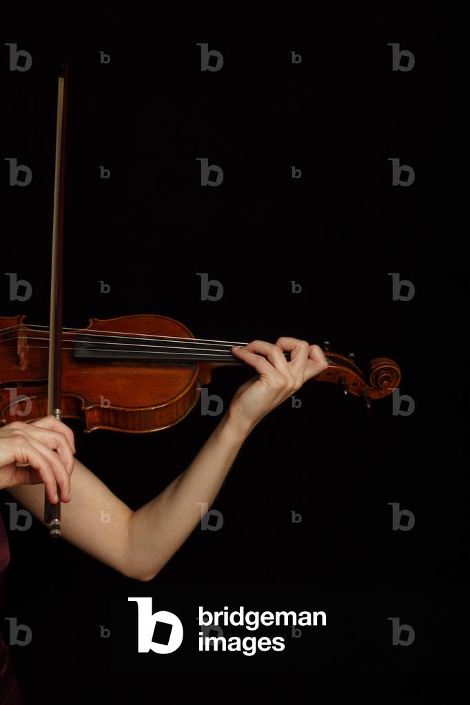 Playing on a violin