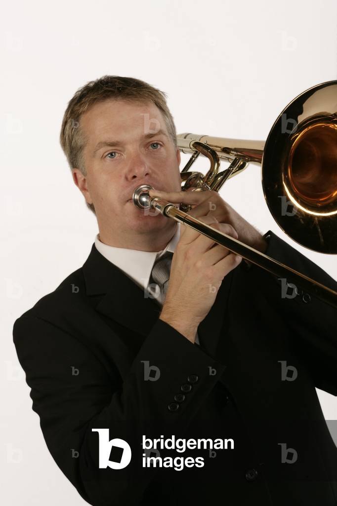 Bass Trombone player in playing position