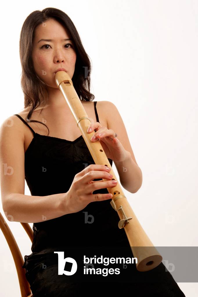 Young woman playing the tenor