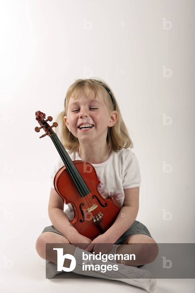 Young girl holding her
