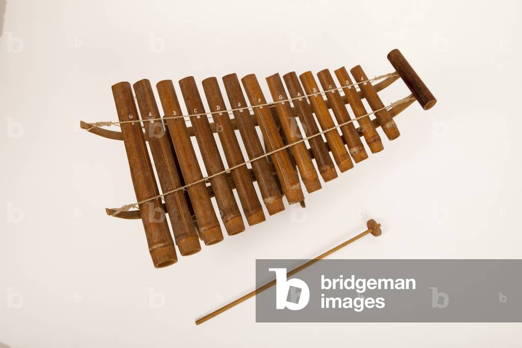 A bamboo xylophone, a traditional Asian folk percussion  instrument