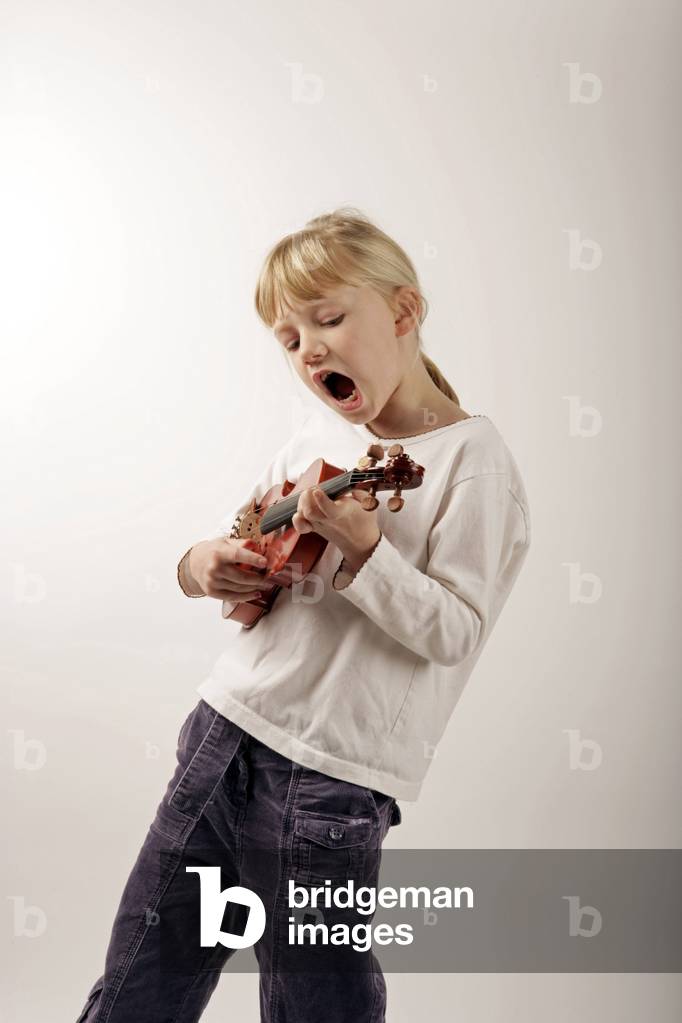 Young girl plucking her