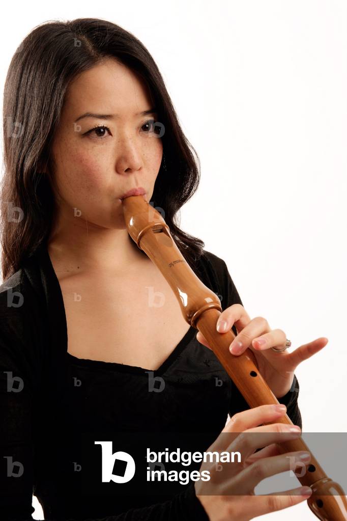 Young woman playing a alto