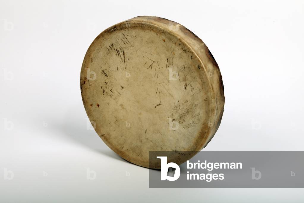 Red Indian Leather or natural skinned hand drum.