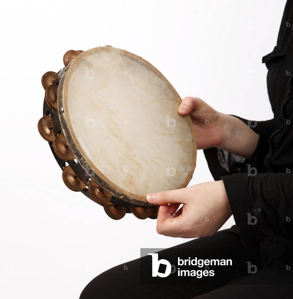Tambourine technique, a thumb roll in playing position.