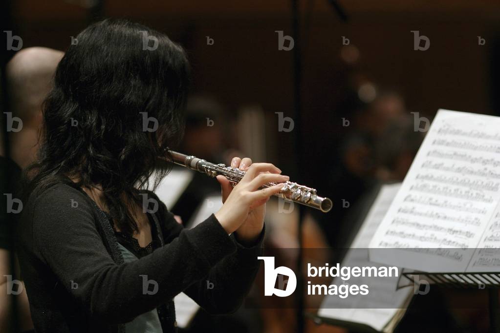 Flautist / flutist -