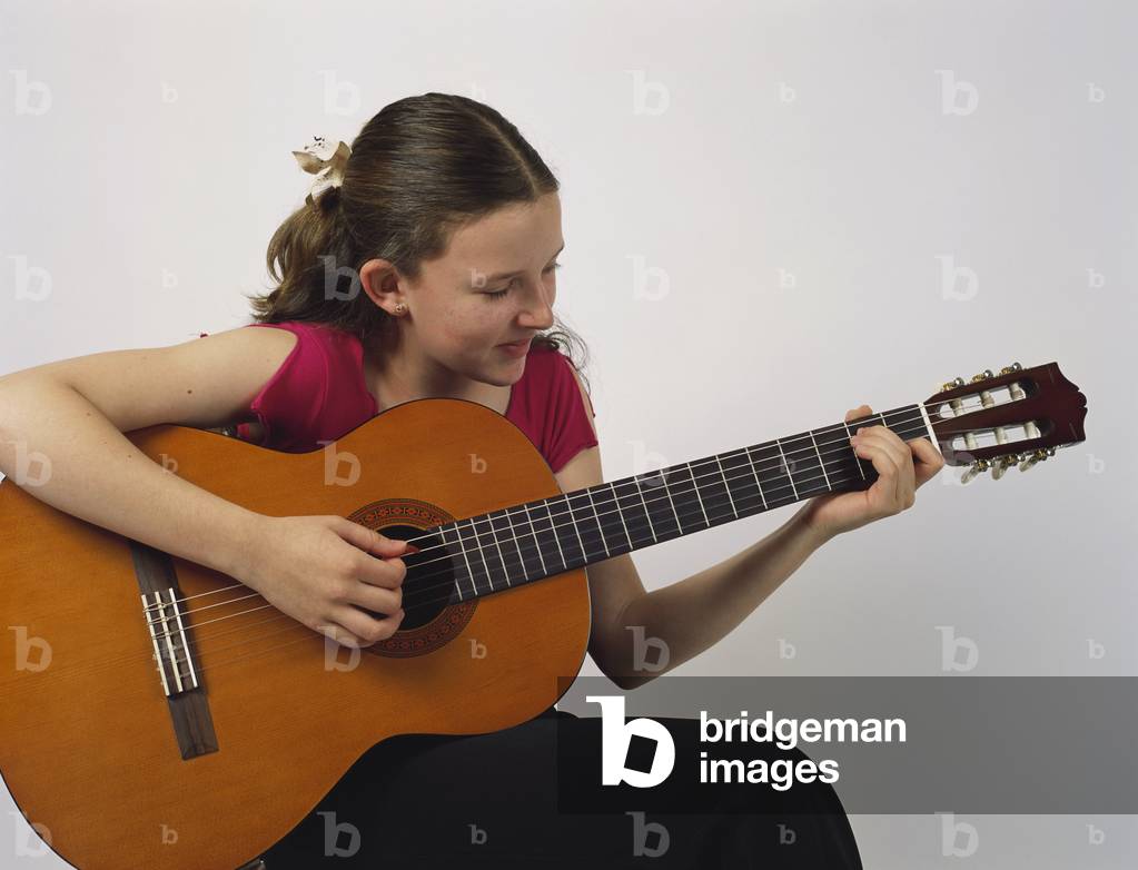 Acoustic guitar played with