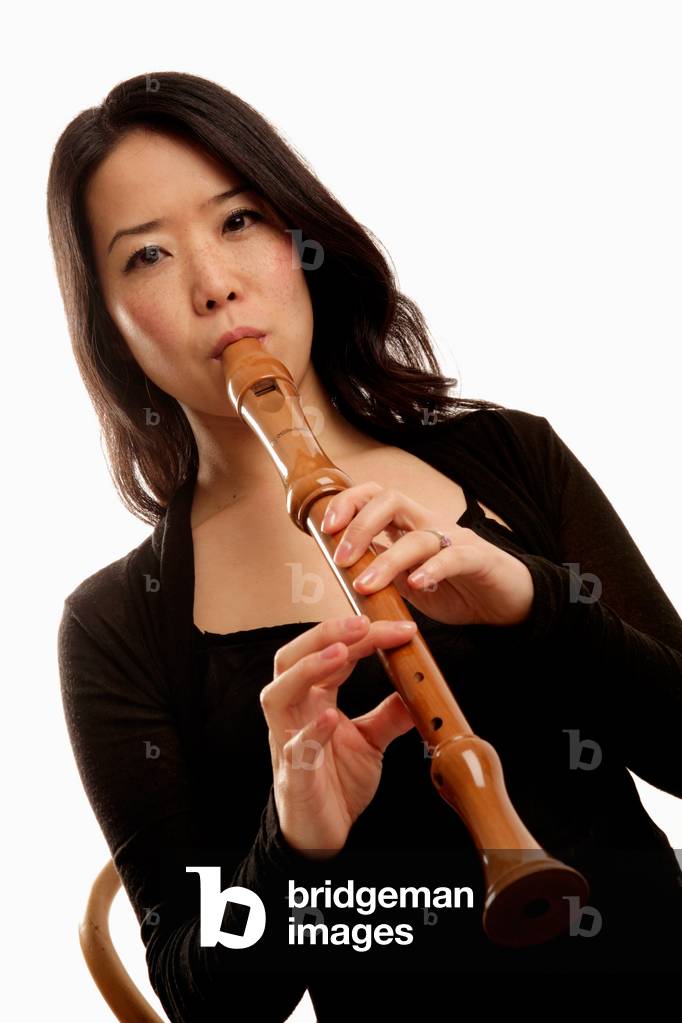 Young woman playing a alto