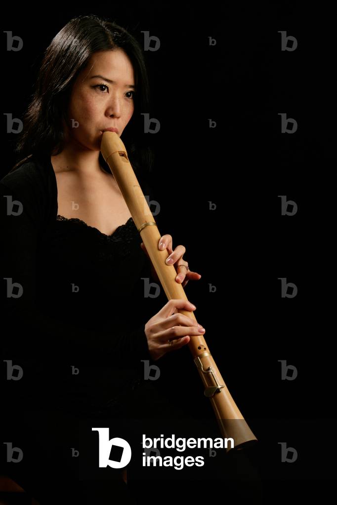 Young woman playing the tenor