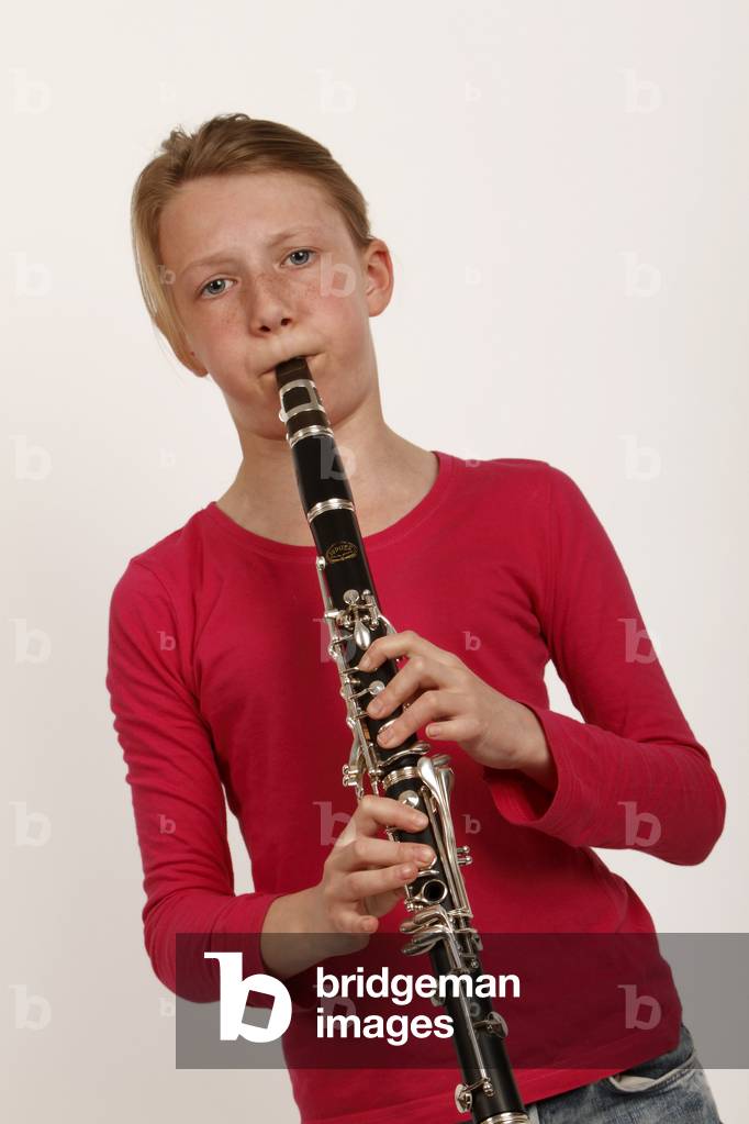Young girl playing the B flat clarinet