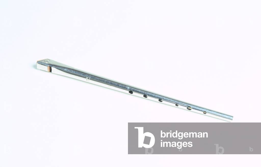 Tin whistle on white