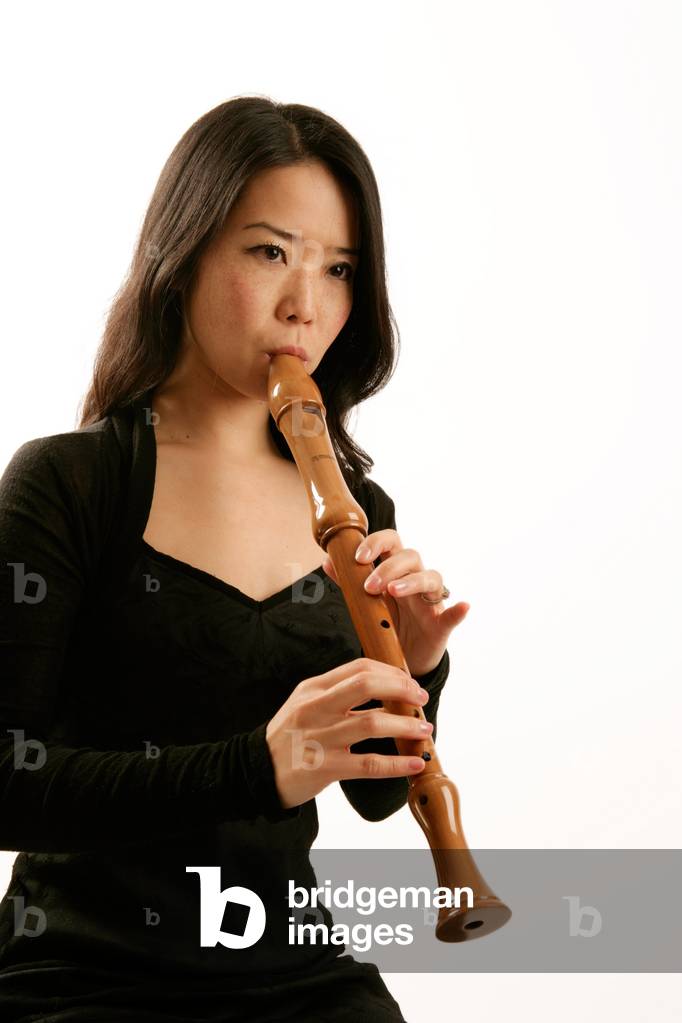 Young woman playing a alto