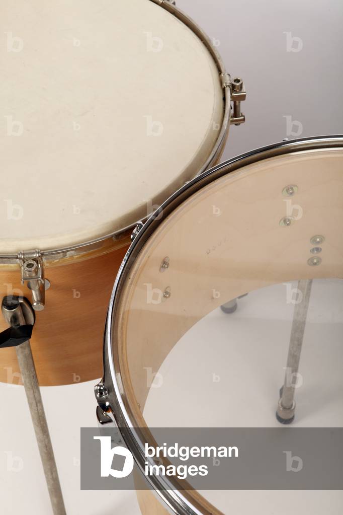 close up of Primary or Junior school 2 Timpani, one  with a plastic head and the other with a calf head - generic