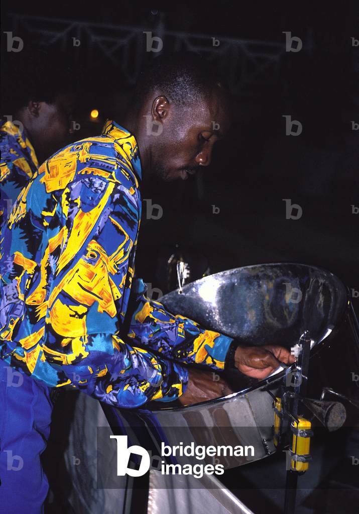 INSTRUMENTS-PERCUSSION-DRUMS-STEEL DRUMS Player in