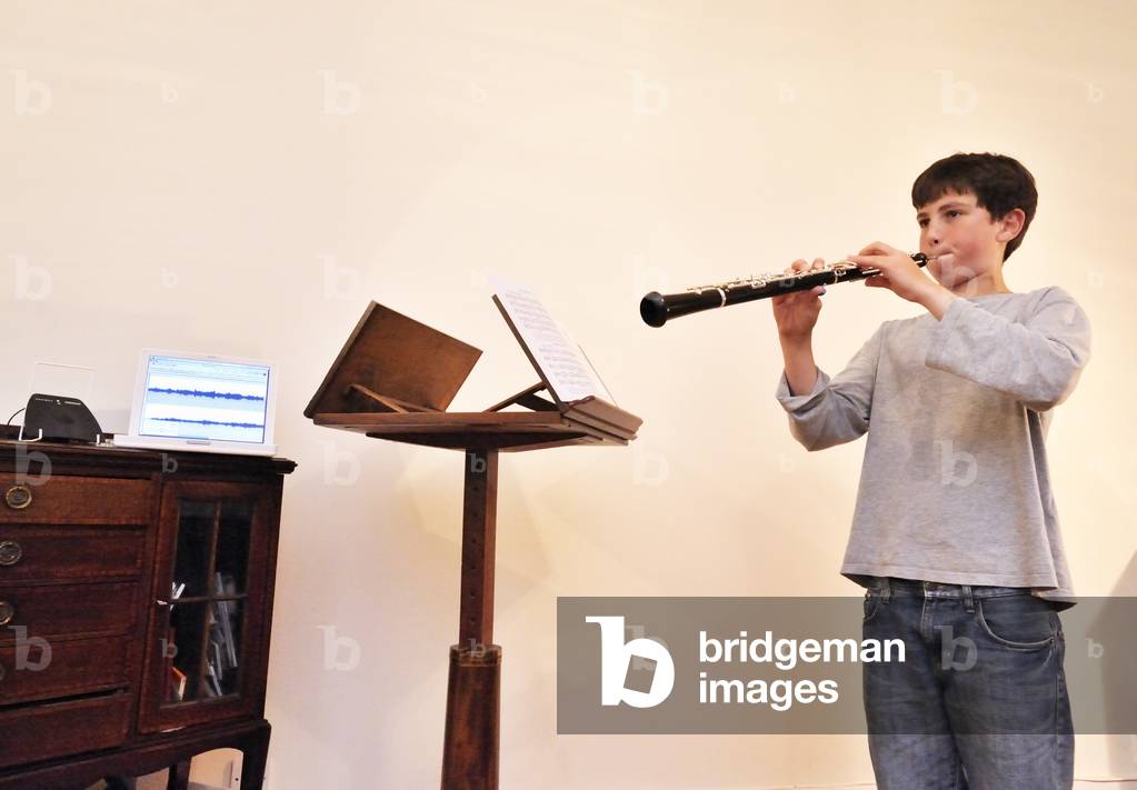 Teenage boy making a recording