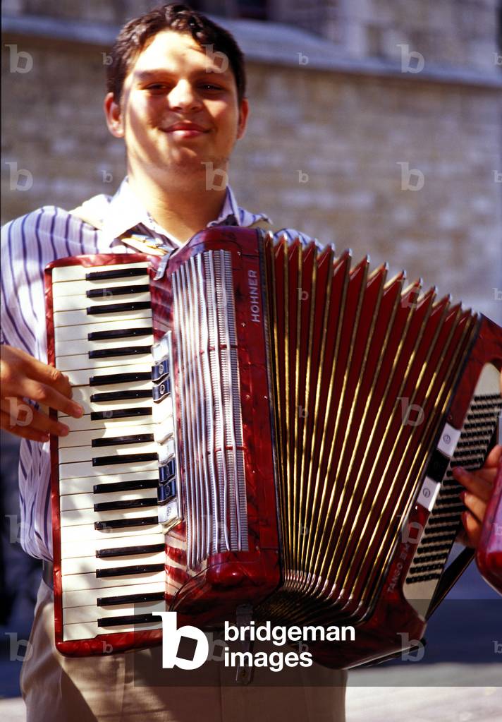 Busker playing Hohner Accordion