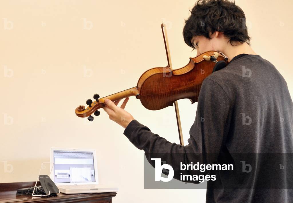 Teenage boy making a recording