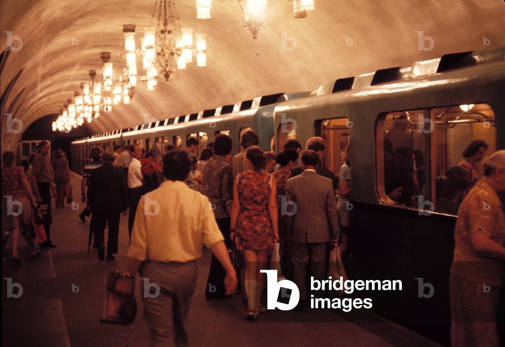 Commuters board train at Moscow Metro station, Russia