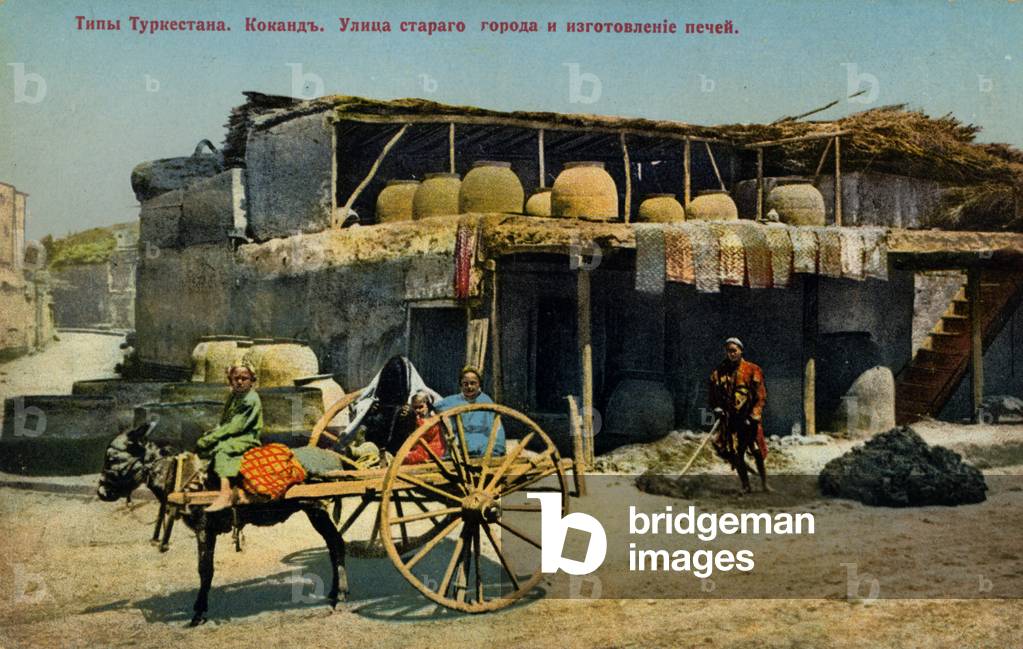 Kokand family next to their house (postcard)