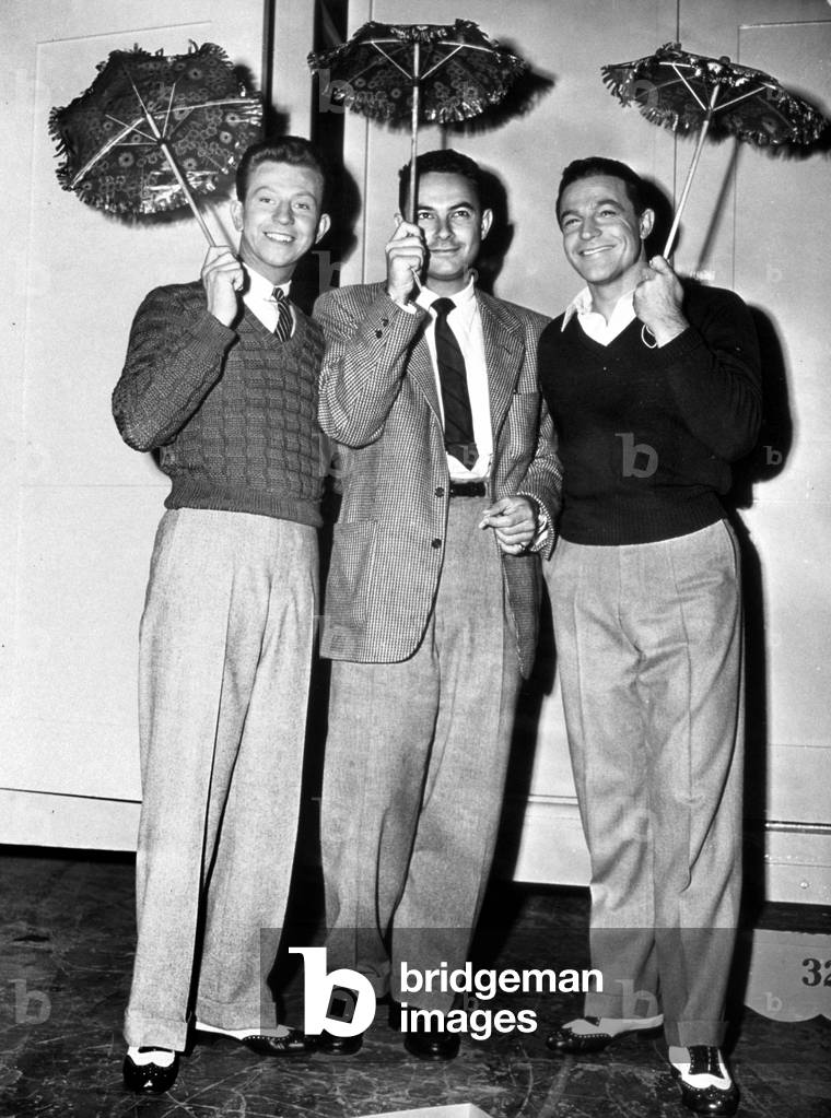 Director Stanley Donen with Gene Kelly and Donald O'Connor on set of film Singin' in the Rain at MGM Studios , 1952