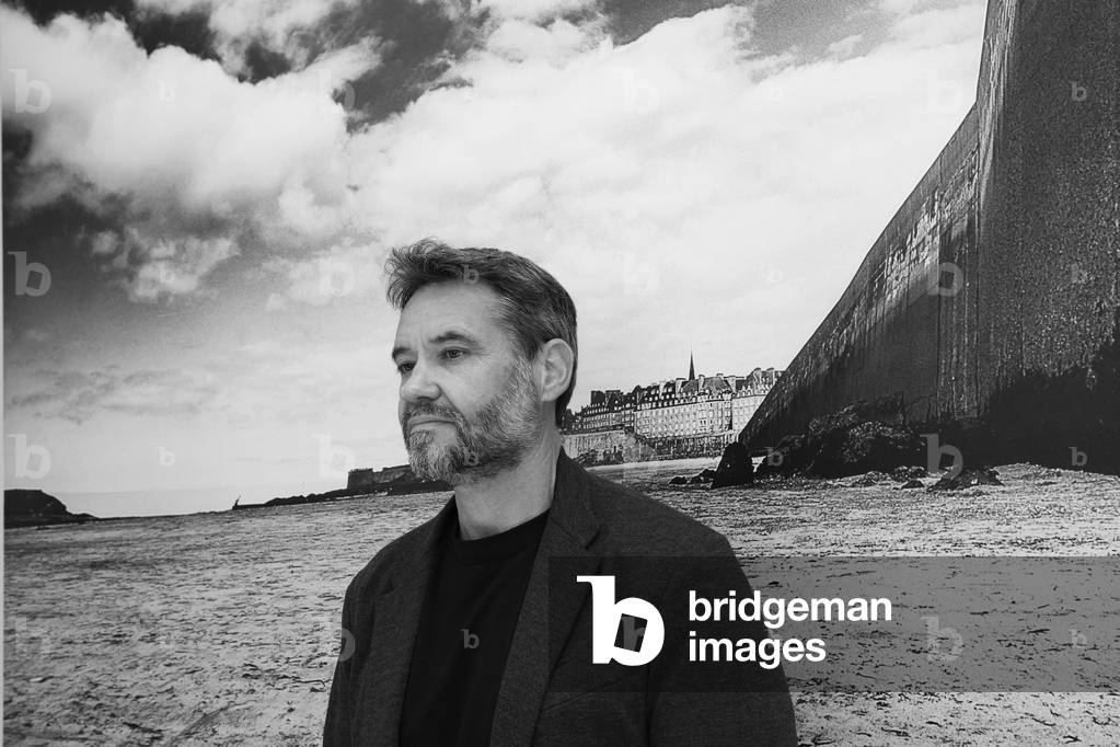 Portrait of Franck Bouysse (b/w photo, May 23, 2021)