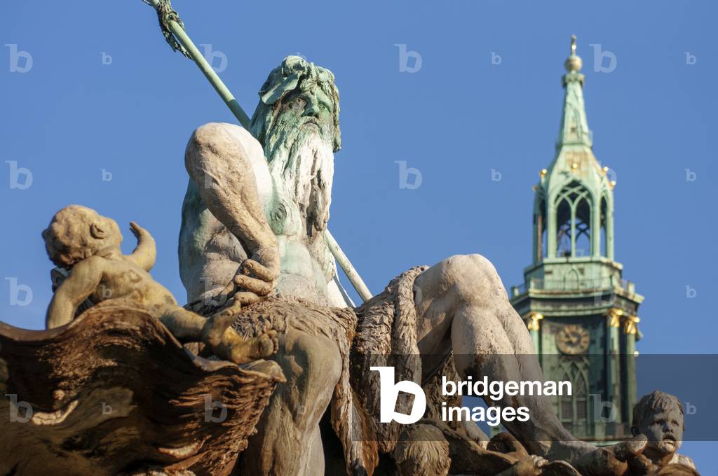 Neptune fountain in front of the St. Mary Church or Marienkirche in Mitte in Berlin, Germany (photo)