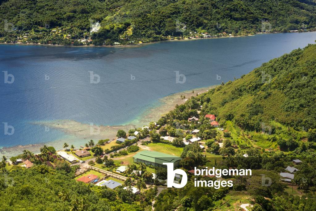 Typical houses, road, and reef see, Moorea island (aerial view), Windward Islands, Society Islands, French Polynesia, Pacific Ocean, 2020 (photo)