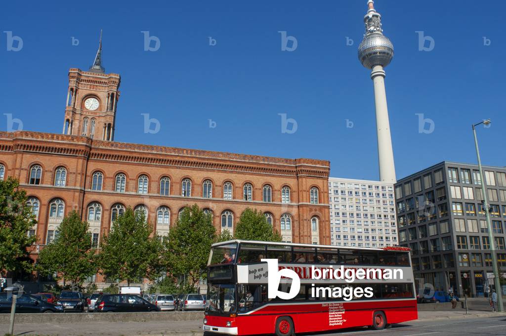 Red Sightseeing tour bus tv tower and The Rotes Rathaus (Red City Hall) of Berlin, located in the Mitte district, Berlin, Germany (photo)