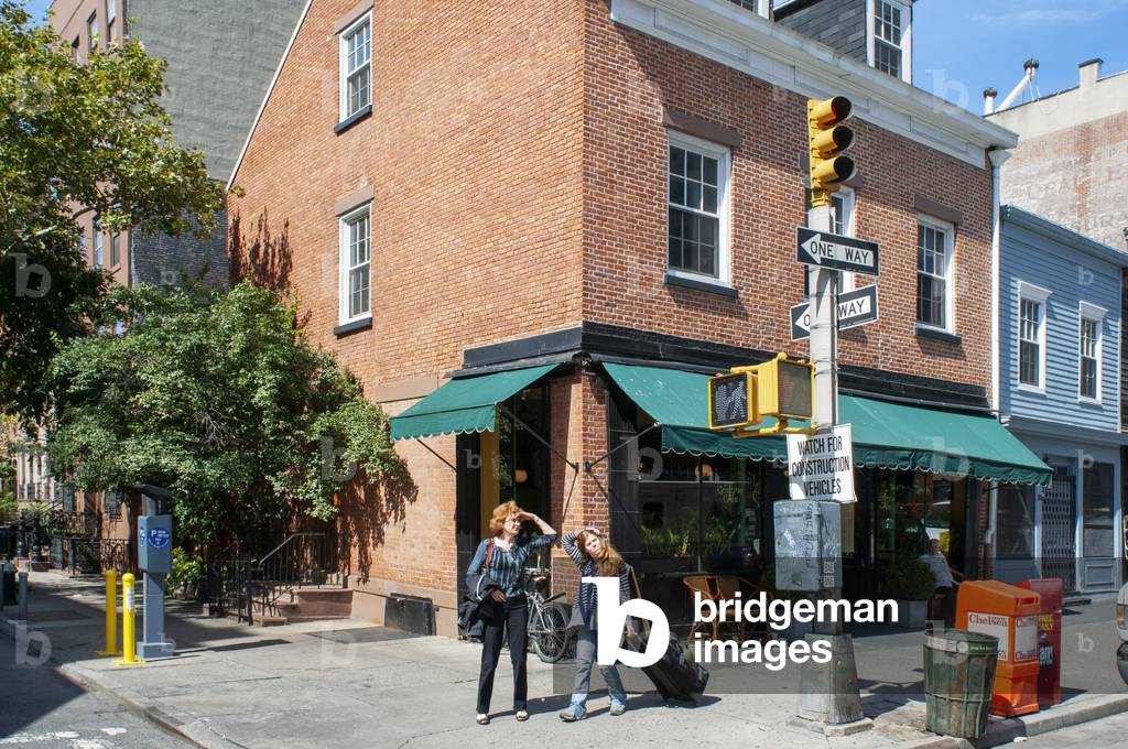 Close up of the exterior of the Chelsea brick house in Chelsea neighborhood Manhattan, USA (photo)