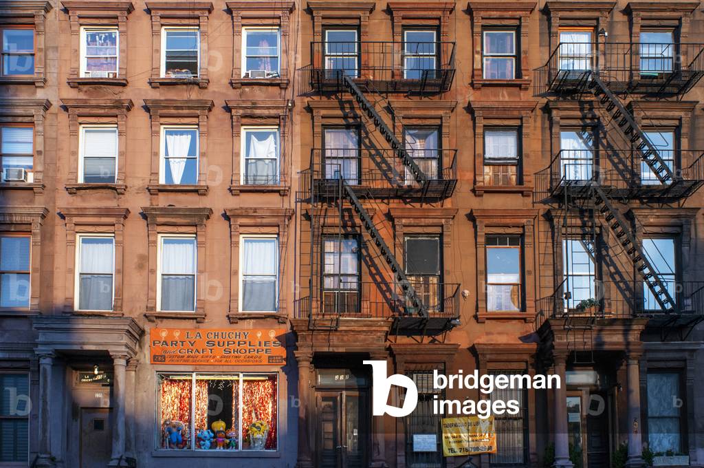 Fire escapes on tenement apartment buildings in Harlem neighborhood, New York City, 2020 (photo)