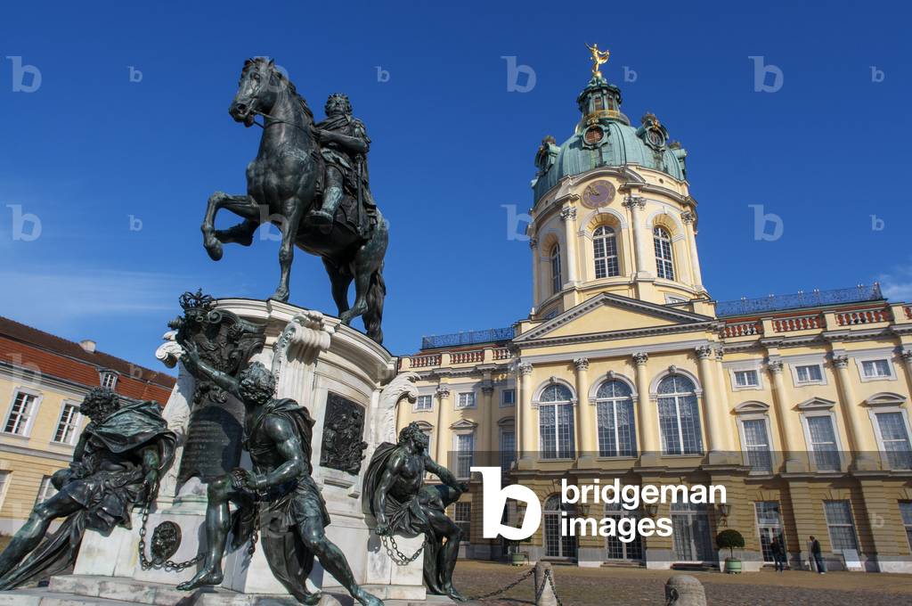 Statue of Frederick William I outside Charlottenburg Palace, Sculptures at Charlottenburg Palace entrance and its park Schlossgarten rebuilt after Second World War in, Berlin, Germany (photo)