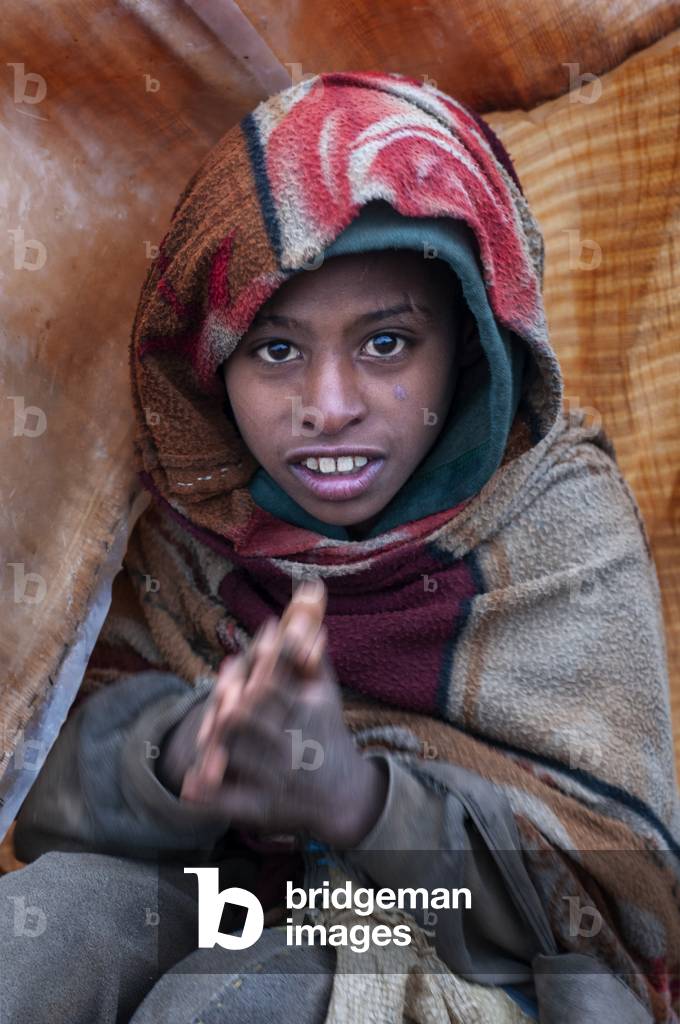 Local villagers selling hats and pots souvenir in the Simien Mountains National Park, Amhara Region, Ethiopia  (photo)