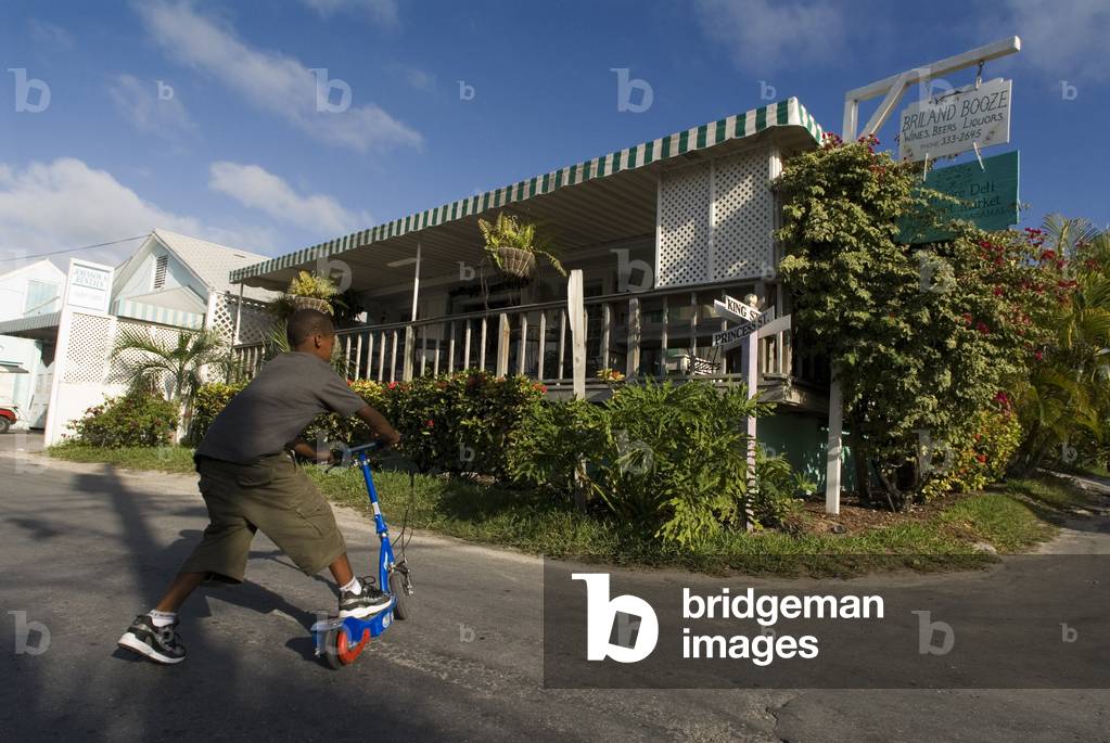 Child in a skate and loyalist home, Bahamas (photo)