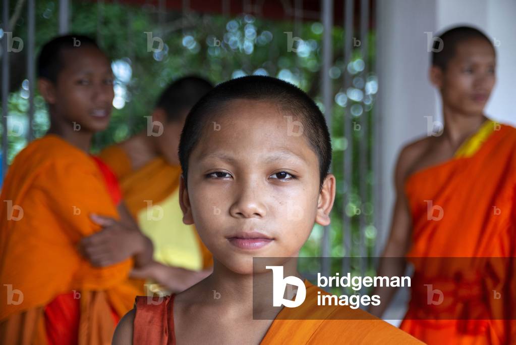 Monks in Wat Phousi temple on the Mount Phou Si, Luang Prabang, Laos, Asia (photo)