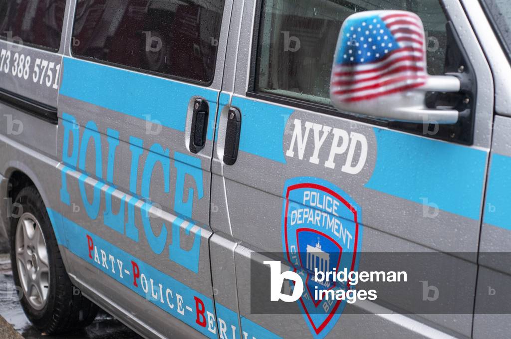 A New York police van nypd promotes a disco and fun in the center of Berlin, Germany (photo)