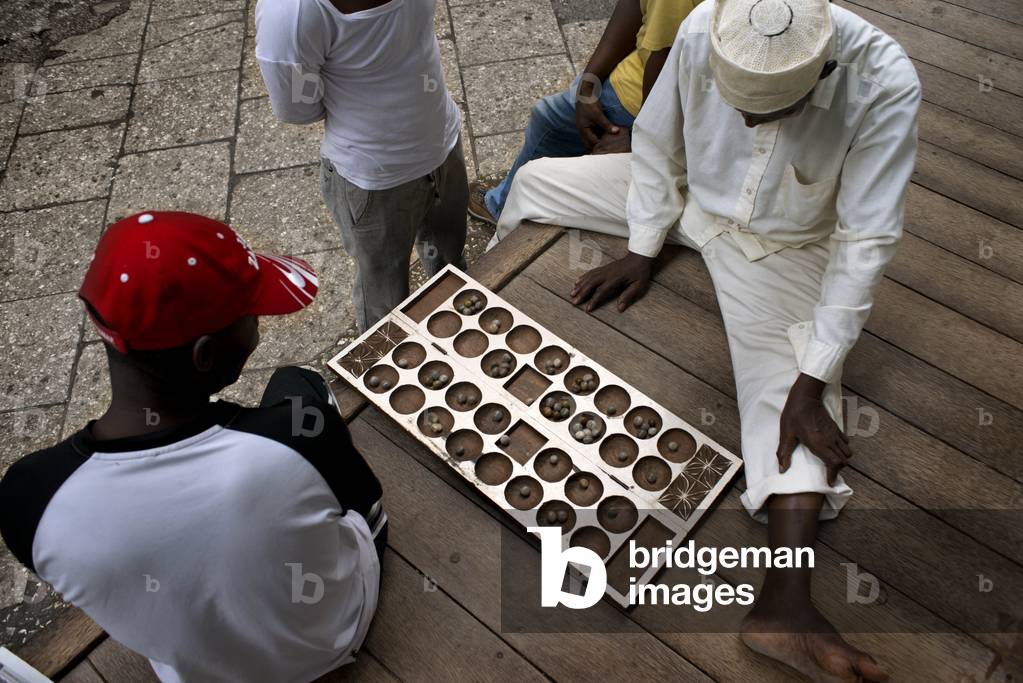 Bao players in Stone Town, Zanzibar, Tanzani, Africa (photo)